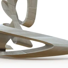 Close view of a travertine sculpture: a wide curved ribbon with looping petals rising from it