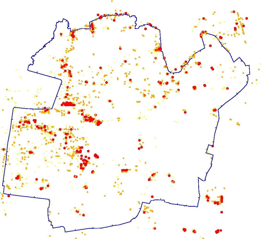 Old city outline with scattered red and yellow dots marking damaged buildings.