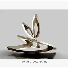 The same sculpture with a gold-plated finish on a grey background