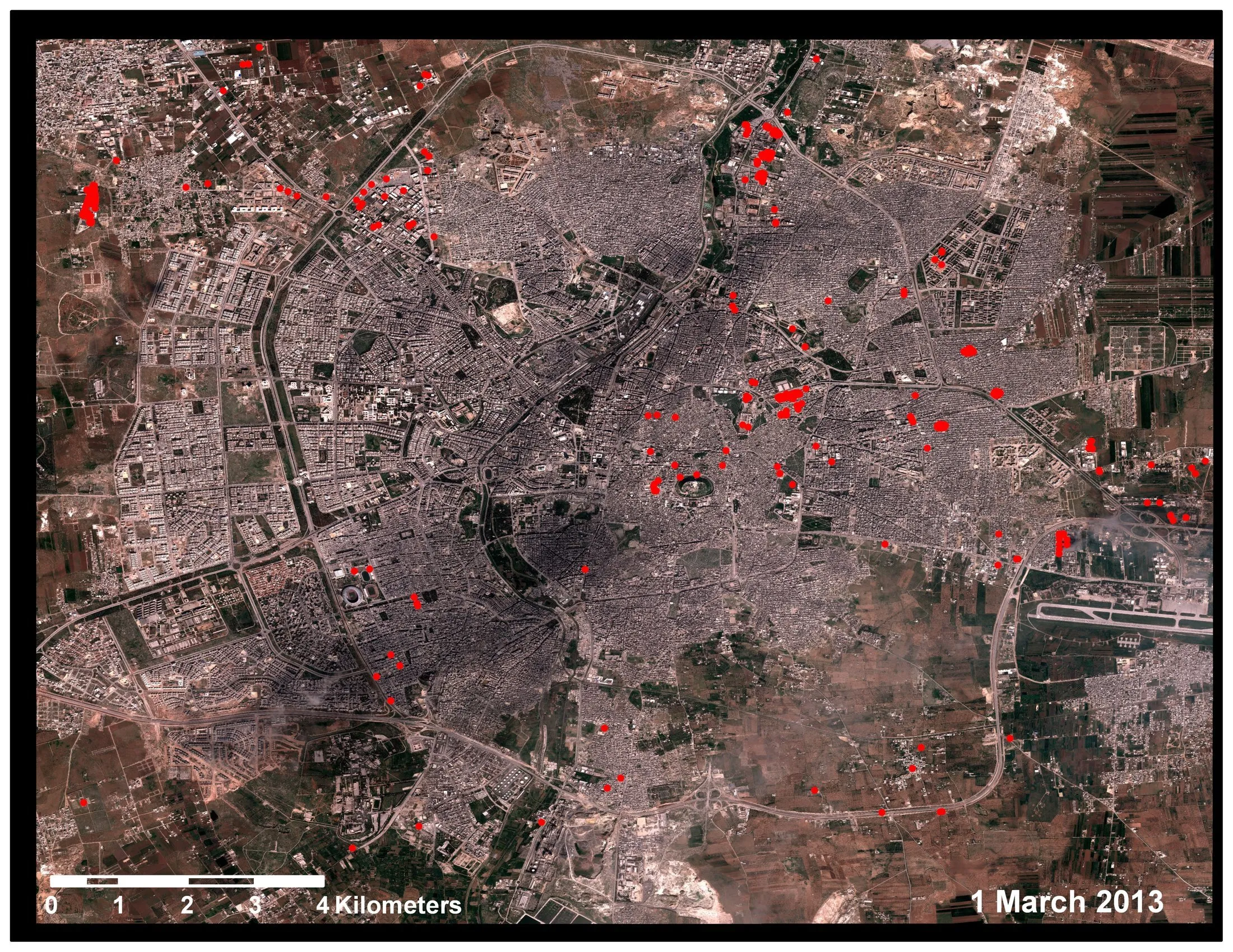 Satellite map of Aleppo with red damage marks and a date scale along the lower edge.
