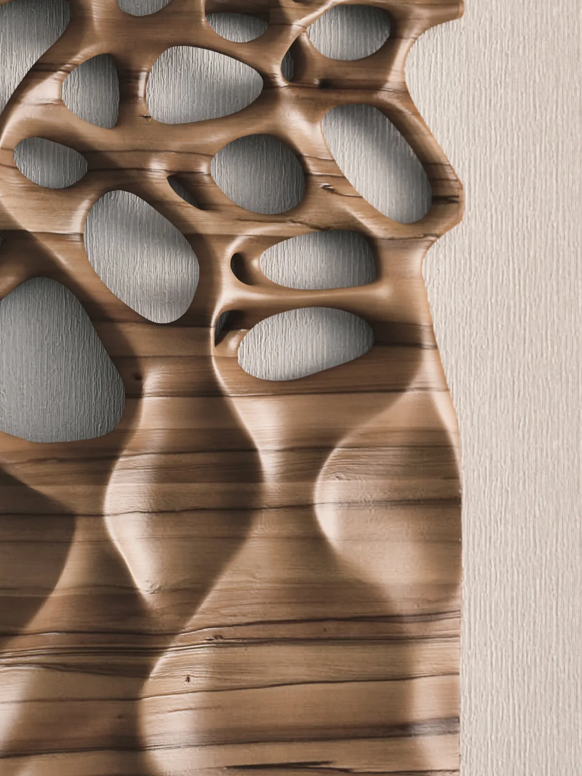 A carved wood panel with rounded cavities and raised edges stands outdoors beside a tree stump.